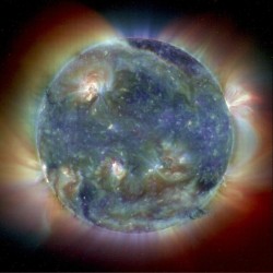 2. A color composite of the Sun's features, May 1988. Photo Credit: SOHO/Extreme Ultraviolet Imaging Telescope (EIT) Consortium, May 1988; SOHO is a project of international cooperation between European Space Agency (ESA, http://www.esa.int) and National Aeronautics and Space Administration (NASA, http://www.nasa.gov).

