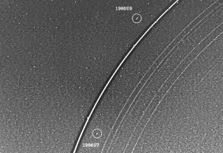 5. The Shepherd Moons of Uranus' Epsilon Ring, 1986U8 (ouside, at top) and 1986U7 (inside, at bottom), January 21, 1986. Photo Credit: Voyager Mission (http://voyager.jpl.nasa.gov), Voyager 2, January 21, 1986, Image Number: A86-7006, Title: Uranus' Shepard Satellites, Ref: P-29466B/W; NASA Ames Imaging Library System (AILS, http://ails.arc.nasa.gov), NASA Ames Research Center (http://www.arc.nasa.gov), National Aeronautics and Space Administration (NASA, http://www.nasa.gov)/Jet Propulsion Laboratory (JPL, http://www.jpl.nasa.gov), Government of the United States of America.
