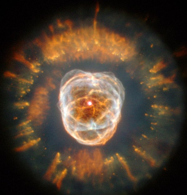 The Eskimo Nebula - NGC 2392. Photo Credit: The Eskimo Nebula - NGC 2392, January 24, 2000, NASA's Hubble Space Telescope, GRIN (http://grin.hq.nasa.gov) Database Number: GPN-2000-000882, National Aeronautics and Space Administration (NASA, http://www.nasa.gov)/A. Fruchter/ERO Team/STScI, Government of the United States of America.