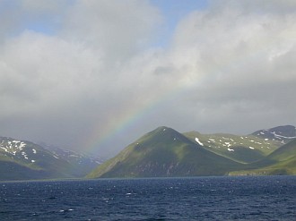 1. Returning to Dutch Harbor after a long trip, the Miller Freeman is greeted with a rainbow, July 2000. Unalaska, State of Alaska, USA. Photo Credit: Life At Sea - Photos from July 2000, NOAA Ship MILLER FREEMAN, (http://www.moc.noaa.gov/mf/index.html), National Oceanic and Atmospheric Administration (NOAA, http://www.noaa.gov), United States Department of Commerce (http://www.commerce.gov), Government of the United States of America (USA).