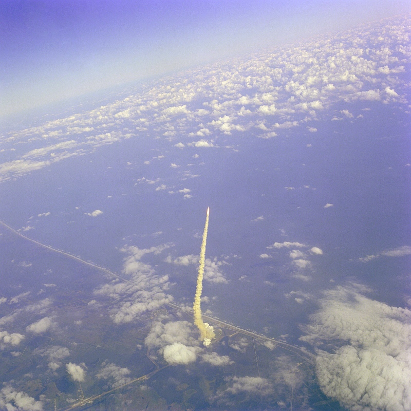 14. Spectacular Aerial View of Space Shuttle Columbia (STS-2) Roaring Into Space From Launch Pad 39A on November 12, 1981 at 10:09:59 a.m. EST, As Seen From NASA's Shuttle Training Aircraft (STA), NASA Kennedy Space Center, State of Florida, USA. Photo Credit: NASA Astronaut John Watts Young; Space Shuttle Columbia (STS-2), Launch Complex 39, Pad A, John F. Kennedy Space Center, November 12, 1981, GRIN (http://grin.hq.nasa.gov) Database Number: GPN-2000-001358, National Aeronautics and Space Administration (NASA, http://www.nasa.gov), Government of the United States of America.