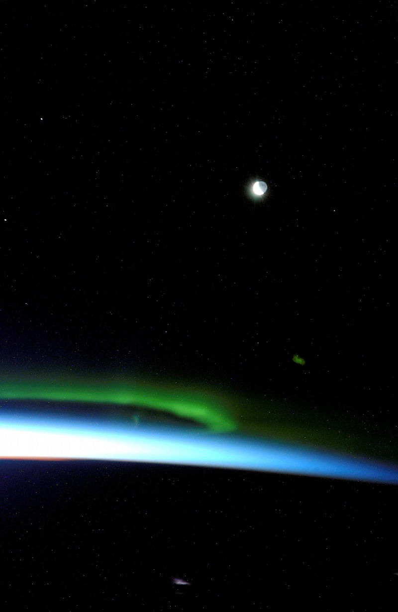 9. The Moon, the Stars, and the Green Aurora Borealis (Northen Lights) Over Earth, August 19, 2006 As Seen From the International Space Station (Expedition 13). NASA; ISS013-E-69635, Green Aurora Borealis (Northern Lights), Earth's Moon, Stars, International Space Station (Expedition Thirteen); Image Science and Analysis Laboratory, NASA-Johnson Space Center. 'Astronaut Photography of Earth - Display Record.' >http://eol.jsc.nasa.gov/scripts/sseop/photo.pl?mission=ISS013&roll=E&frame=69635>; National Aeronautics and Space Administration (NASA, http://www.nasa.gov), Government of the United States of America (USA).