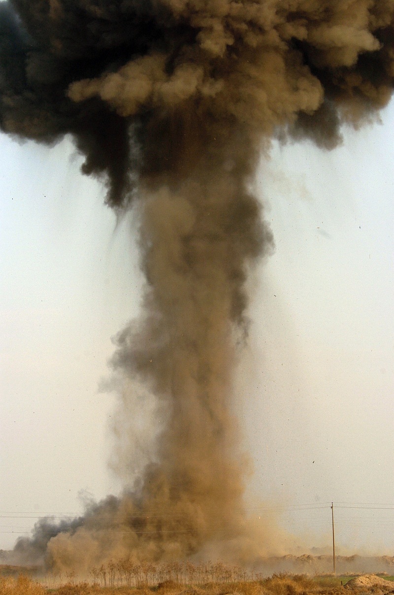2. Explosive and Destructive Power: Towering Mushroom-Shaped Cloud. Controlled Detonation of Unexploded Ordnance, February 10, 2005, Baghdad, Al Jumhuriyah al Iraqiyah - Republic of Iraq. Photo Credit: Photographer's Mate 1st Class Richard J. Brunson, Navy NewsStand - Eye on the Fleet Photo Gallery (http://www.news.navy.mil/view_photos.asp, 050210-N-6932B-257), United States Navy (USN, http://www.navy.mil), United States Department of Defense (DoD, http://www.DefenseLink.mil or http://www.dod.gov), Government of the United States of America (USA).