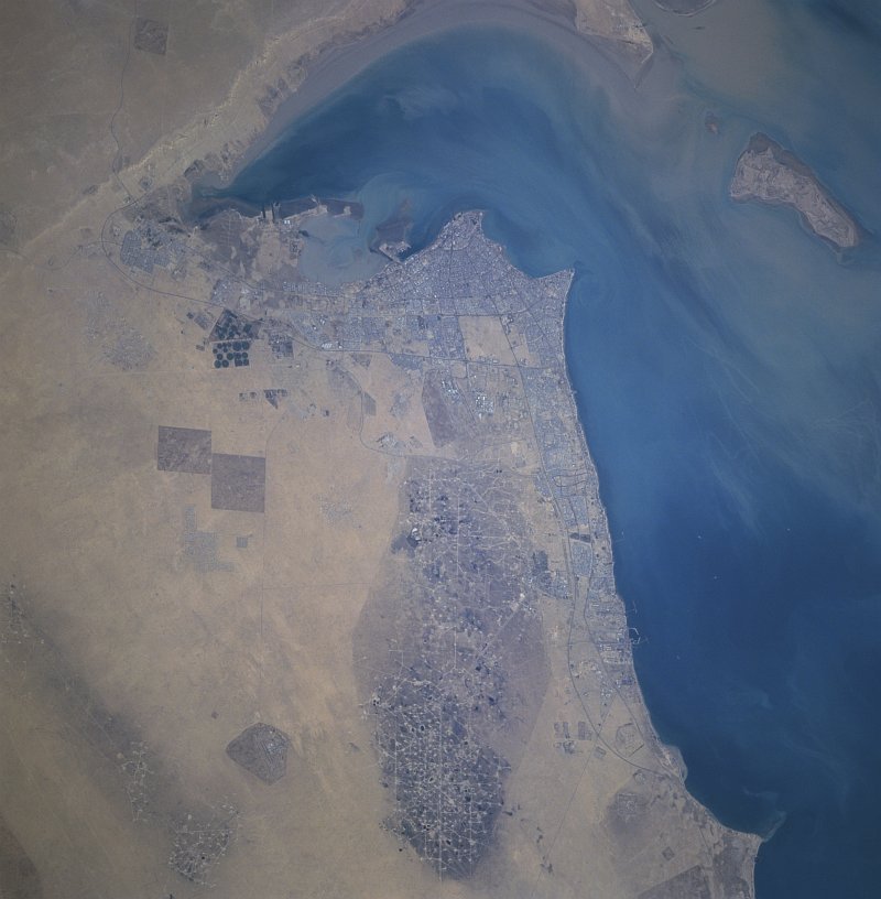 Photo #4. View From Outer Space of a Small Portion of Earth, Our Home Planet, November 1996: Dawlat al Kuwayt - State of Kuwait. Photo Credit: Persian Gulf, Kuwait City, Al Burqan Oil Field, and Kuwait's plain and desert; NASA's Space Shuttle Columbia: STS-80 Mission; NASA-Johnson Space Center. 'Astronaut Photography of Earth - Display Record.' <http://earth.jsc.nasa.gov/sseop/efs/images.pl?photo=STS080-733-21>; National Aeronautics and Space Administration (NASA, http://www.nasa.gov), Government of the United States of America (USA). The photo's full size request URL is <http://earth.jsc.nasa.gov/scripts/sseop/LargeImageAccess.pl?directory=EFS/highres/STS080&filename=STS080-733-21.JPG&filesize=11112114>