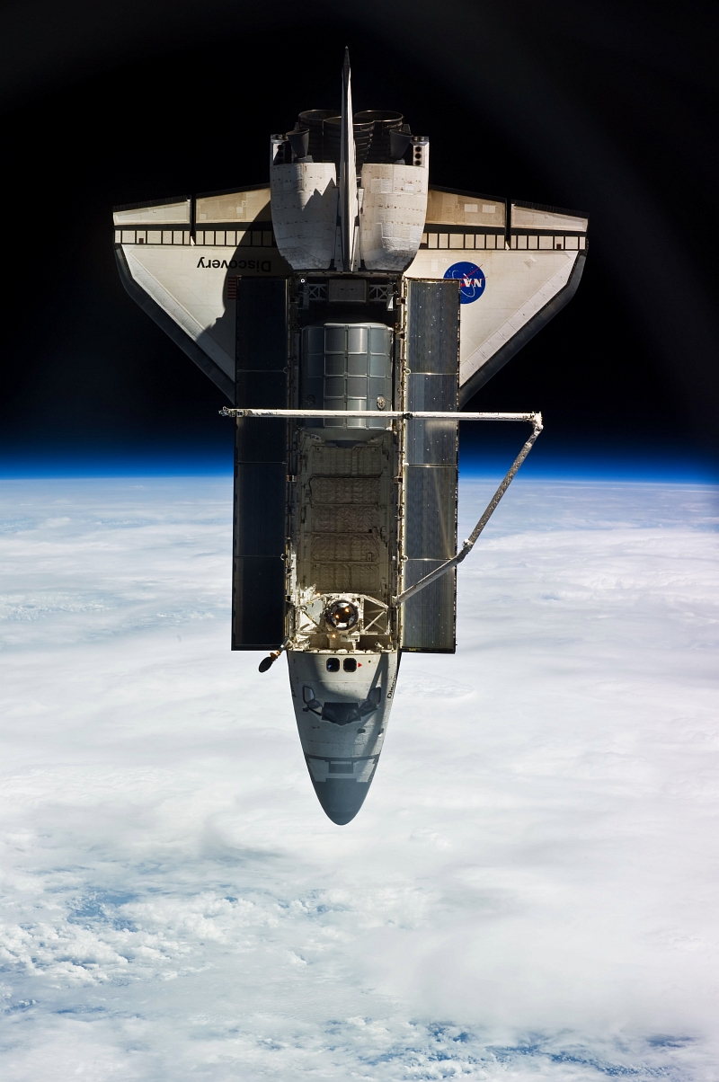 2. Space Shuttle Discovery (STS-131) Orbits Over Cloudy Blue-and-White Earth, April 17, 2010, As Seen From the International Space Station (Expedition Twenty-Three). Photo Credit: STS-131 Shuttle Mission Imagery (http://spaceflight.nasa.gov/gallery/images/shuttle/sts-131/ndxpage1.html), ISS023-E-025298 (http://spaceflight.nasa.gov/gallery/images/shuttle/sts-131/html/iss023e025298.html), NASA Human Space Flight (http://spaceflight.nasa.gov), National Aeronautics and Space Administration (NASA, http://www.nasa.gov), Government of the United States of America.