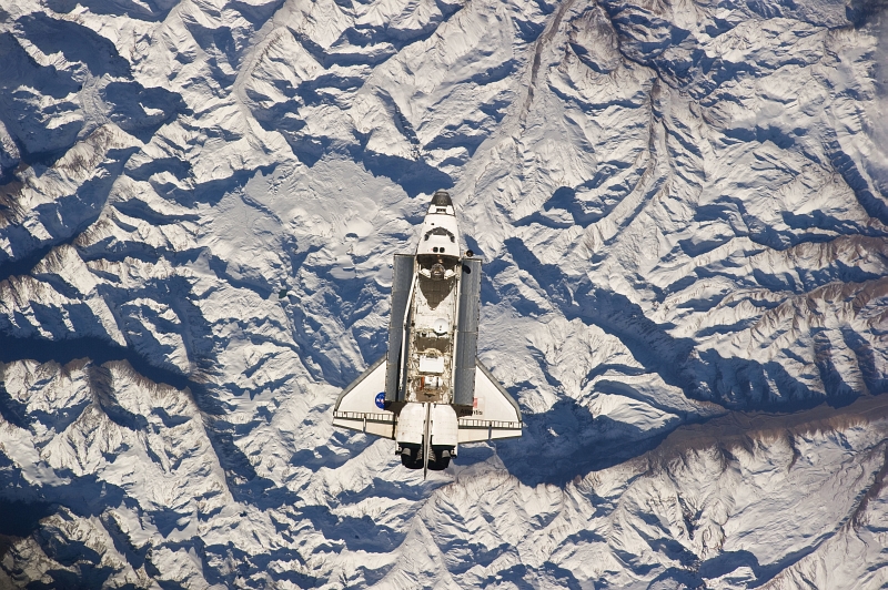 5. Space Shuttle Atlantis (STS-132) Orbits High Above the Andes Mountains Near the Border of Argentina and Chile, May 16, 2010, As Seen From the International Space Station (Expedition Twenty-Three). Photo Credit: STS-132 Shuttle Mission Imagery (http://spaceflight.nasa.gov/gallery/images/shuttle/sts-132/ndxpage1.html), ISS023-E-044476 (http://spaceflight.nasa.gov/gallery/images/shuttle/sts-132/html/iss023e044476.html), NASA Human Space Flight (http://spaceflight.nasa.gov), National Aeronautics and Space Administration (NASA, http://www.nasa.gov), Government of the United States of America. Additional details from NASA: 'Center point coordinates of the pictured area are 34.6 degrees south latitude and 69.9 degrees west longitude. Rio Atuel is in the river valley in the lower right of the photo and the Atuel Caldera is near the center of the image by the port payload bay door.'
