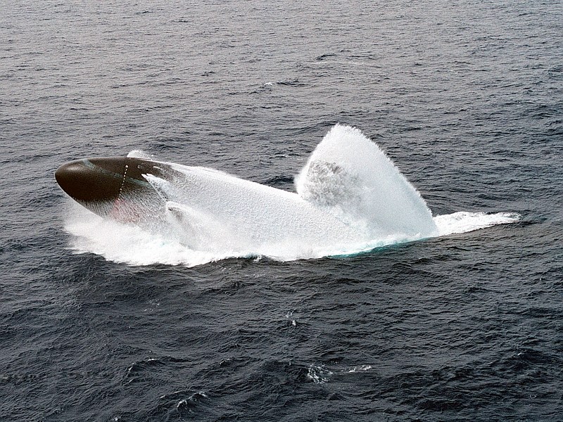 1. The United States Navy Attack Submarine USS Columbus (SSN 762) Condusts A Submarine Emergency Surfacing (Emergency Blow) Drill In the Vast Pacific Ocean, June 4, 1998, Off the Coast of Oahu, State of Hawaii, USA. Photo Credit: Photographer's Mate 2nd Class David C. Duncan, United States Navy (USN, http://www.navy.mil); Defense Visual Information Center (DVIC, http://www.DoDMedia.osd.mil, DN-SD-03-10300 and 980604-N-7726D-002) and United States Navy (USN, http://www.navy.mil), United States Department of Defense (DoD, http://www.DefenseLink.mil or http://www.dod.gov), Government of the United States of America (USA).