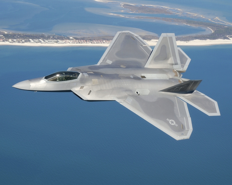 29. A U.S. Air Force F-22A Raptor Stealth Fighter Jet Flies Over the Emerald Coast, State of Florida, USA. Master Sgt. Michael Ammons, United States Air Force; VRIN 051222-F-7709A-121; United States Air Force (USAF, http://www.af.mil), United States Department of Defense (DoD, http://www.DefenseLink.mil or http://www.dod.gov), Government of the United States of America (USA).