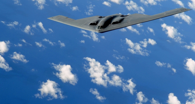 16. A U.S. Air Force B-2 Spirit Stealth Bomber, Assigned to the 13th Expeditionary Bomb Squadron and Deployed to Territory of Guam, USA, Flying Over the Western Pacific Ocean During An Aerial Refueling Mission, May 12, 2009. Photo Credit: Senior Airman Christopher Bush, United States Air Force; Defense Visual Information (DVI, http://www.DefenseImagery.mil, 090512-F-2482B-207) and United States Air Force (USAF, http://www.af.mil), United States Department of Defense (DoD, http://www.DefenseLink.mil or http://www.dod.gov), Government of the United States of America (USA).
