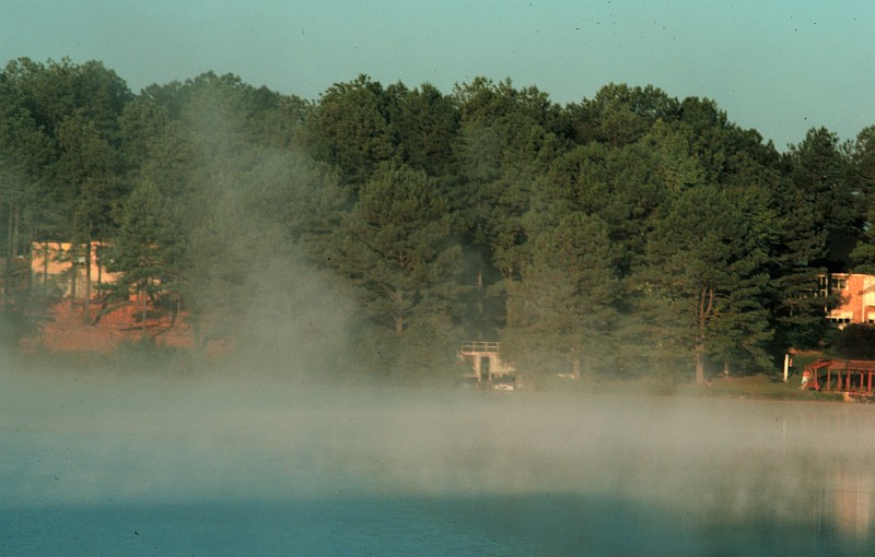 October 1978: Early Morning Lake Fog on Lake Carroll, Carrollton, State of Georgia, USA. Photo Credit: Ralph F. Kresge, National Oceanic and Atmospheric Administration Photo Library (http://www.photolib.noaa.gov, wea02057), Historic NWS Collection, NOAA Central Library, National Oceanic and Atmospheric Administration (NOAA, http://www.noaa.gov), United States Department of Commerce (http://www.commerce.gov), Government of the United States of America (USA).