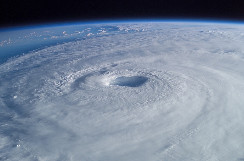 5. Hurricane Isabel Over the Atlantic Ocean, September 15, 2003 at 10:54:05.640 GMT, As Seen From the International Space Station (Expedition 7). Photo Credit: NASA Astronaut Dr. Edward 'Ed' Tsang Lu, Ph.D. aboard the International Space Station (Expedition Seven); ISS007-E-14887, Hurricane Isabel's Eye, Atlantic Ocean; Image Science and Analysis Laboratory, NASA-Johnson Space Center. 'Astronaut Photography of Earth - Display Record.' <http://eol.jsc.nasa.gov/scripts/sseop/photo.pl?mission=ISS007&roll=E&frame=14887>; National Aeronautics and Space Administration (NASA, http://www.nasa.gov), Government of the United States of America (USA).