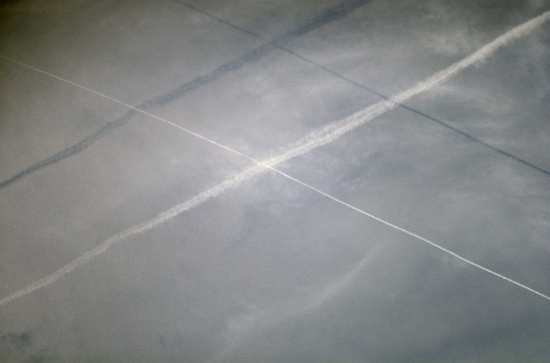 18. Two Contrails and Their Shadows Over the Western Pacific Ocean's Celebes Sea, June 27, 2007 at 01:14:38.440 GMT As Seen From the International Space Station (Expedition 15), Latitude (LAT): 3.3, Longitude (LON): 122.1, Altitude (ALT): 178 Nautical Miles, Sun Azimuth (AZI): 59 degrees, Sun Elevation Angle (ELEV): 46 degrees. Photo Credit: NASA; ISS015-E-14611, Contrails, Cloud layer, Celebes Sea, Western Pacific Ocean, International Space Station (Expedition Fifteen); Image Science and Analysis Laboratory, NASA-Johnson Space Center. 'Astronaut Photography of Earth - Display Record.' <http://eol.jsc.nasa.gov/scripts/sseop/photo.pl?mission=ISS015&roll=E&frame=14611>; National Aeronautics and Space Administration (NASA, http://www.nasa.gov), Government of the United States of America (USA).
