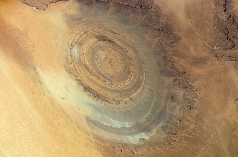 25. Richat Structure, the Beautiful, Circular Geological Formation In Mauritania's Gres de Chinguetti Plateau, Maur Adrar Desert, Al Jumhuriyah al Islamiyah al Muritaniyah - Islamic Republic of Mauritania, December 10, 2007, As Seen From the International Space Station (Expedition 16). Photo Credit: NASA; ISS016-E-15803, Richat Structure, Mauritania, Sahara Desert, International Space Station (Expedition Sixteen); Image Science and Analysis Laboratory, NASA-Johnson Space Center. 'Astronaut Photography of Earth - Display Record.' <http://eol.jsc.nasa.gov/scripts/sseop/photo.pl?mission=ISS016&roll=E&frame=15803>; National Aeronautics and Space Administration (NASA, http://www.nasa.gov), Government of the United States of America (USA).