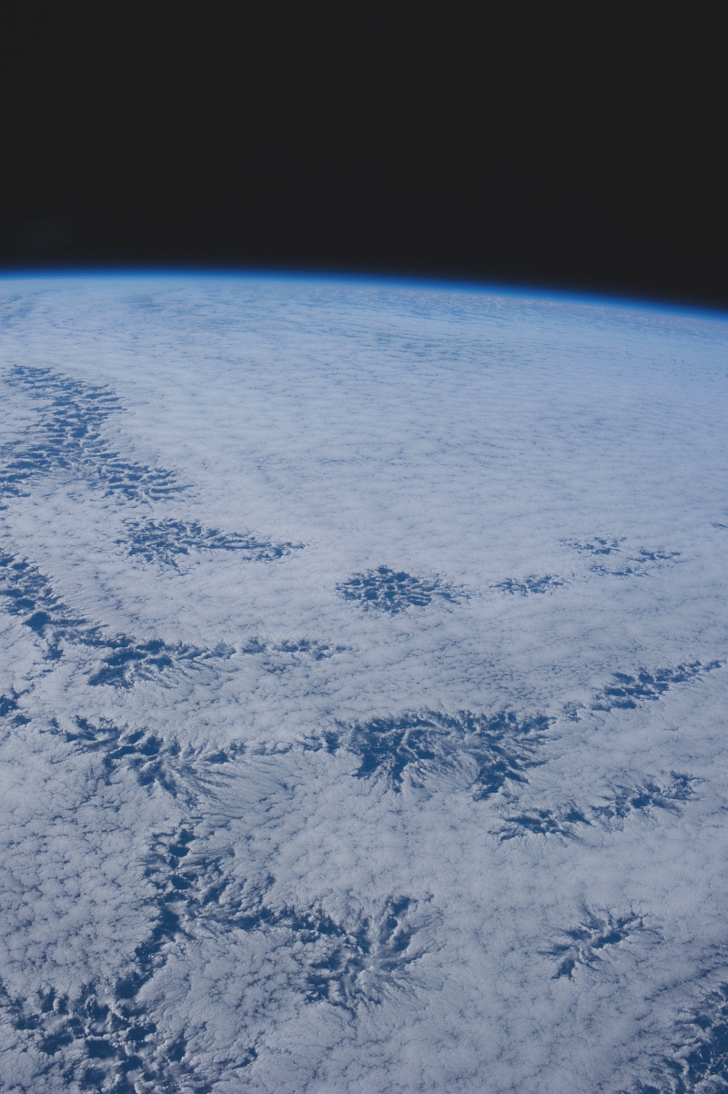 48a. Cloud Patterns, July 26, 2013 at 20:40:37 GMT, As Seen From the International Space Station (Expedition 36) While Orbiting Over the South Pacific Ocean, Latitude (LAT): -43.8, Longitude (LON): -114.2, Altitude (ALT): 226 Nautical Miles, Sun Azimuth (AZI): 345 degrees, Sun Elevation Angle (ELEV): 26 degrees. Photo Credit: NASA; ISS036-E-25841, International Space Station (Expedition 36); Image Science and Analysis Laboratory, NASA-Johnson Space Center. 'The Gateway to Astronaut Photography of Earth.' <http://eol.jsc.nasa.gov/scripts/sseop/photo.pl?mission=ISS036&roll=E&frame=25841>; National Aeronautics and Space Administration (NASA, http://www.nasa.gov), Government of the United States of America (USA).