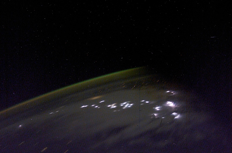 5. Aurora Australis and Lightning, April 23, 2003 at 08:23:44.729 GMT As Seen From the International Space Station (Expedition 6). Photo Credit: NASA; ISS006-E-48197, Aurora Australis or Southern Lights, Lightning, International Space Station (Expedition Six); Image Science and Analysis Laboratory, NASA-Johnson Space Center. 'Astronaut Photography of Earth - Display Record.' <http://eol.jsc.nasa.gov/scripts/sseop/photo.pl?mission=ISS006&roll=E&frame=48197> National Aeronautics and Space Administration (NASA, http://www.nasa.gov), Government of the United States of America (USA).