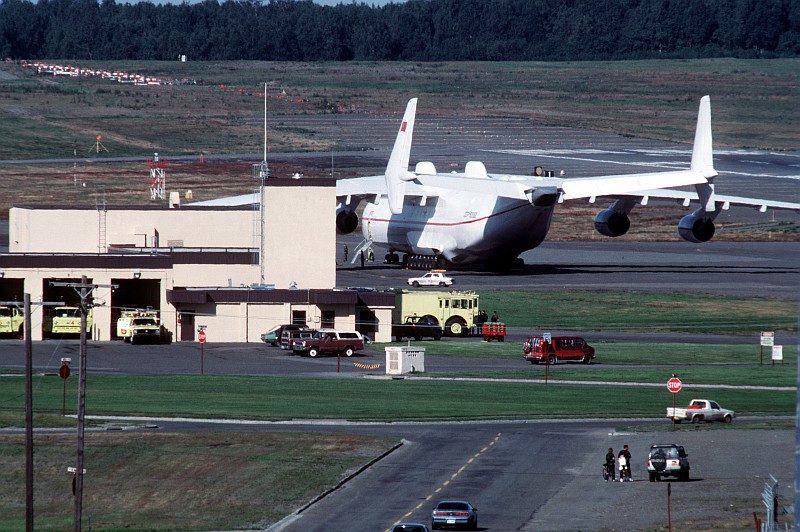 6. Rear View of the Soviet An-225 Mriya Heavy Transport Aircraft As It Sits On the Flight Line, August 1989, Elmendorf Air Force Base, State of Alaska, USA. Photo Credit: Sgt. Gregory A. Suhay, United States Air Force (USAF, http://www.af.mil); Defense Visual Information Center (DVIC, http://www.DoDMedia.osd.mil, DFST9005771) and United States Air Force (USAF, http://www.af.mil), United States Department of Defense (DoD, http://www.DefenseLink.mil or http://www.dod.gov), Government of the United States of America (USA).