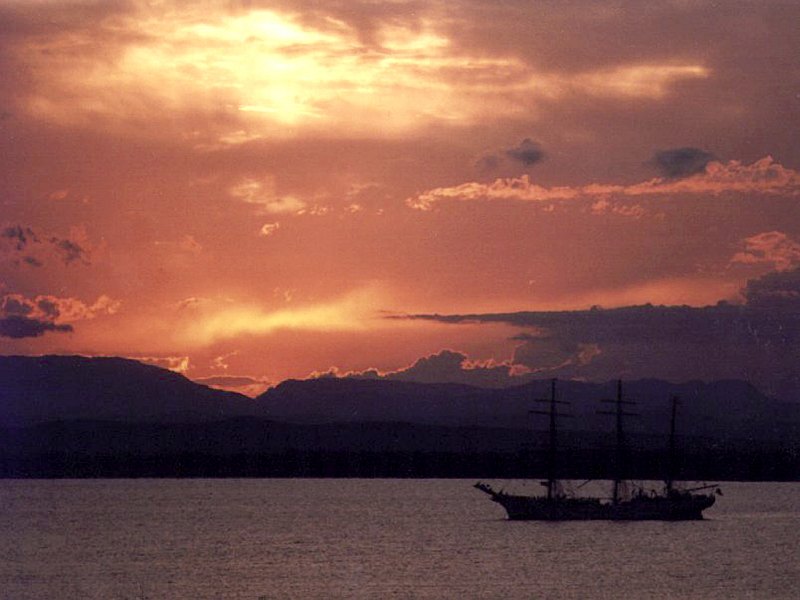 32. Sunset, May 20, 1995, Guantanamo Bay, Republica de Cuba - Republic of Cuba. Photo Credit: Lieutenant Commander (LCDR) Michael L. Finch, United States Navy (USN, http://www.navy.mil); United States Coast Guard (USCG, http://www.uscg.mil) Visual Information Gallery (http://cgvi.uscg.mil/media/main.php, 990520-G-3295F-001; USCG PLS ImageID: 3941, USCG Picture Desk ImageID: 0031H; Object Name: "COAST GUARD CUTTER EAGLE (WIX 327) (FOR RELEASE)"), United States Department of Homeland Security (DHS, http://www.dhs.gov), Government of the United States of America (USA).