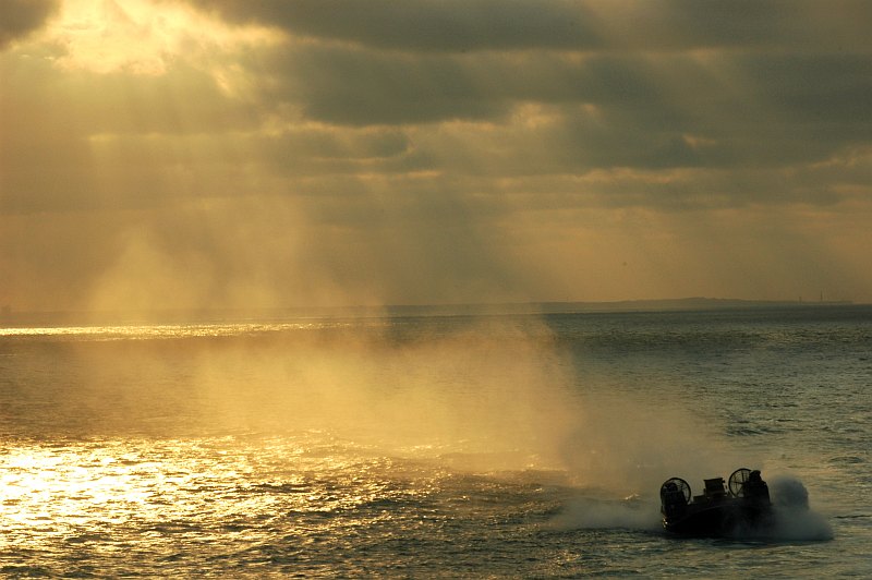 52. The Sun's Golden Rays, June 13, 2007, Atlantic Ocean. Photo Credit: Mass Communication Specialist 3rd Class Patrick Gearhiser, Navy NewsStand - Eye on the Fleet Photo Gallery (http://www.news.navy.mil/view_photos.asp, 070613-N-4014G-412), United States Navy (USN, http://www.navy.mil), United States Department of Defense (DoD, http://www.DefenseLink.mil or http://www.dod.gov), Government of the United States of America (USA).