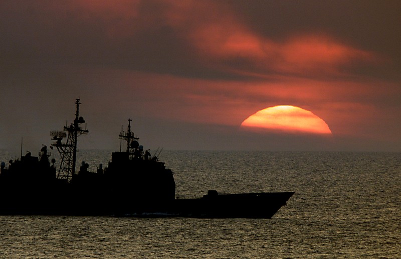 73. Sol, Nearly Half-Visible, Sinks Below the Horizon -- It's Another Majestic Setting of Earth's Sun, May 18, 2000, Atlantic Ocean. Photo Credit: Petty Officer 2nd Class Shane McCoy, United States Navy (USN, http://www.navy.mil); DefenseLINK News Photos (http://www.DefenseLink.mil/photos/, 000518-N-6967M-503), United States Department of Defense (DoD, http://www.DefenseLink.mil or http://www.dod.gov), Government of the United States of America (USA).