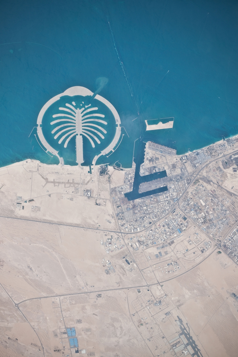 9. Palm Jebel Ali, March 13, 2010 at 10:32:46 GMT, Dubai, Al Imarat al Arabiyah al Muttahidah - United Arab Emirates, As Seen From the International Space Station (Expedition 22), Latitude (LAT): 26.1, Longitude (LON): 55.7, Altitude (ALT): 183 Nautical Miles, Sun Azimuth (AZI): 231 degrees, Sun Elevation Angle (ELEV): 48 degrees. Photo Credit: NASA, International Space Station (Expedition Twenty-Two), ISS022-E-101577; Image Science and Analysis Laboratory, NASA-Johnson Space Center. 'Astronaut Photography of Earth - Display Record.' <http://eol.jsc.nasa.gov/scripts/sseop/photo.pl?mission=ISS022&roll=E&frame=101577>; National Aeronautics and Space Administration (NASA, http://www.nasa.gov), Government of the United States of America (USA).
