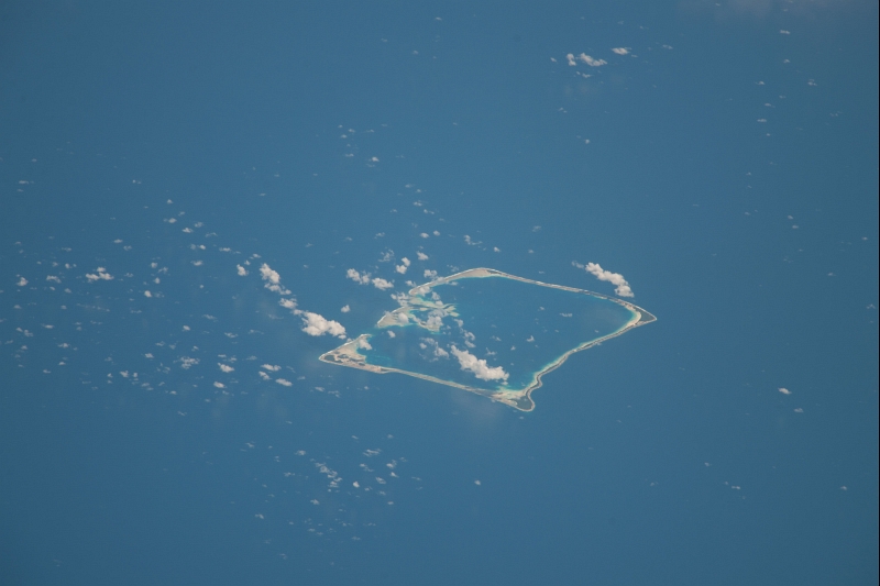 1. Nukufetau, Tuvalu, An Atoll In the South Pacific Ocean, February 17, 2014 at 23:29:44 GMT, As Seen From the International Space Station (Expedition 38), Latitude (LAT): -16.2, Longitude (LON): 177.1, Altitude (ALT): 227 Nautical Miles, Sun Azimuth (AZI): 74 degrees, Sun Elevation Angle (ELEV): 76 degrees. Photo Credit: NASA; ISS038-E-51668, International Space Station (Expedition 38); Image Science and Analysis Laboratory, NASA-Johnson Space Center. "The Gateway to Astronaut Photography of Earth." <http://eol.jsc.nasa.gov/scripts/sseop/photo.pl?mission=ISS038&roll=E&frame=51668>; National Aeronautics and Space Administration (NASA, http://www.nasa.gov), Government of the United States of America (USA).
