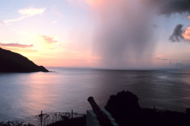 1. A rain shaft as seen from Man-of-War Bay, Tobago, Caribbean Sea, September 1980. Photo Credit: Mary Hollinger, NOAA Biologist, NODC; National Oceanic and Atmospheric Administration Photo Library (http://www.photolib.noaa.gov), Small World Collection, National Oceanic and Atmospheric Administration (NOAA, http://www.noaa.gov), United States Department of Commerce (http://www.commerce.gov), Government of the United States of America.
