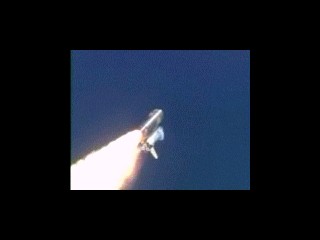 13. STS-114 Mission, Space Shuttle Discovery, July 26, 2005 at NASA's John F. Kennedy Space Center, State of Florida, USA. Reaching the sound barrier, breaking the sound barrier: Flying at transonic speeds (flying transonically) -- speeds varying near and at the speed of sound (supersonic) -- can generate impressive condensation clouds caused by the Prandtl-Glauert Singularity. For a scientific explanation, see Professor M. S. Cramer's Gallery of Fluid Mechanics, Prandtl-Glauert Singularity at <http://www.GalleryOfFluidMechanics.com/conden/pg_sing.htm>; and Foundations of Fluid Mechanics, Navier-Stokes Equations Potential Flows: Prandtl-Glauert Similarity Laws at <http://www.Navier-Stokes.net/nspfsim.htm>. Photo Credit: STS-114 Mission, Launch of Space Shuttle Discovery, July 26, 2005. Video frame (still image), showing Space Shuttle Discovery's transonic condensation cloud (vapor cloud), from the NASA launch video 'Master 719511 14:38:49-14:41:20 - Space Shuttle Discovery launches at 9:39 a.m. CDT July 26, 2005,' STS-114 Video Index, Daily Videos: Flight Day 1 (http://spaceflight.nasa.gov/gallery/video/shuttle/sts-114/html/fd1.html), NASA Human Space Flight Web Gallery: Shuttle Gallery (http://spaceflight.nasa.gov/gallery/images/shuttle/), National Aeronautics and Space Administration (NASA, http://www.nasa.gov), Government of the United States of America.