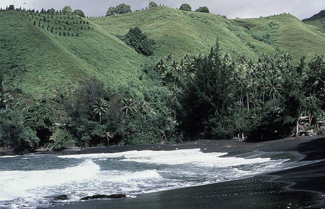 The Beautiful Green Hills and the Black Lava Sand Beach of Tahiti, Territoire de la Polynesie Francaise - Territory of French Polynesia. Photo Credit: Quartermaster Joseph Schebal, NOAA, National Oceanic and Atmospheric Administration Photo Library (http://www.photolib.noaa.gov, theb3089), Historic C&GS Collection, National Oceanic and Atmospheric Administration (NOAA, http://www.noaa.gov), United States Department of Commerce (http://www.commerce.gov), Government of the United States of America (USA).