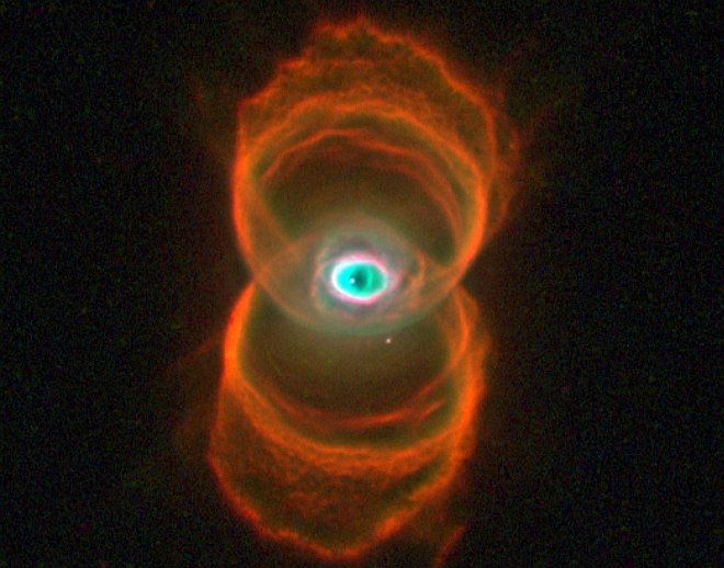 Hourglass Nebula - MyCn18. Photo Credit: Hubble Finds an Hourglass Nebula Around a Dying Star, January 16, 1996, STScI-1996-07, NASA's Earth-orbiting Hubble Space Telescope; Raghvendra Sahai and John Trauger (JPL), WFPC2 Science Team, National Aeronautics and Space Administration (NASA, http://www.nasa.gov), Government of the United States of America (USA).