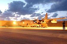 10. United States Air Force (USAF) C-130 Hercules Loaded with Packaged Meals for Southeast Asia Prepares For Takeoff, December 29, 2004. Kadena Air Base, Nippon-koku (Nihon-koku) - Japan. Photo Credit: Tech. Sgt. Richard Freeland, Air Force Link - Week in Photos, December 31, 2004 (http://www.af.mil/weekinphotos/041231-01.html, 041229-F-7194F-021, "U.S. military team arrives to assess disaster relief efforts"), United States Air Force (USAF, http://www.af.mil), United States Department of Defense (DoD, http://www.DefenseLink.mil or http://www.dod.gov), Government of the United States of America (USA).