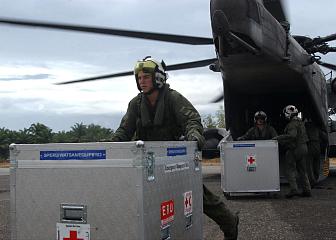 4. Unloading Medical Supplies From a CH-53E Super Stallion Helicopter at Muebaloh City Air Field, January 8, 2005. Meubaloh, Sumatra, Republik Indonesia. Photo Credit: Journalist 3rd Class Ryan Valverde, Navy NewsStand - Eye on the Fleet Photo Gallery (http://www.news.navy.mil/view_photos.asp, 050108-N-4451V-007), United States Navy (USN, http://www.navy.mil), United States Department of Defense (DoD, http://www.DefenseLink.mil or http://www.dod.gov), Government of the United States of America (USA).