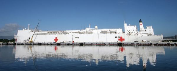 5. Destination Southeast Asia: Loading Donated Medical Supplies Aboard the Huge Military Sealift Command (MSC) Hospital Ship USNS Mercy (T-AH 19). The USNS Mercy contains 12 fully equipped operating rooms, a 1,000-bed hospital facility, digital radiological services, a diagnostic and clinical laboratory, a pharmacy, an optometry lab, a CAT scan, and two oxygen-producing plants. January 12, 2005, Pearl Harbor, State of Hawaii, USA. Photo Credit: Photographer's Mate 1st Class William R. Goodwin, Navy NewsStand - Eye on the Fleet Photo Gallery (http://www.news.navy.mil/view_photos.asp, 050112-N-3228G-003), United States Navy (USN, http://www.navy.mil), United States Department of Defense (DoD, http://www.DefenseLink.mil or http://www.dod.gov), Government of the United States of America (USA).