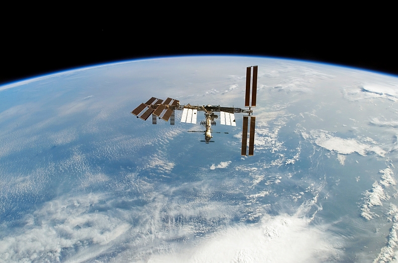 17. International Space Station Orbits Over Cloudy Earth and Earth's Blue Waters, February 18, 2008, As Seen From Space Shuttle Atlantis (STS-122). Photo Credit: NASA; STS-122 Shuttle Mission Imagery (http://spaceflight.nasa.gov/gallery/images/shuttle/sts-122/ndxpage1.html): S122-E-010947 (http://spaceflight.nasa.gov/gallery/images/shuttle/sts-122/html/s122e010947.html), NASA Human Space Flight (http://spaceflight.nasa.gov), National Aeronautics and Space Administration (NASA, http://www.nasa.gov), Government of the United States of America.