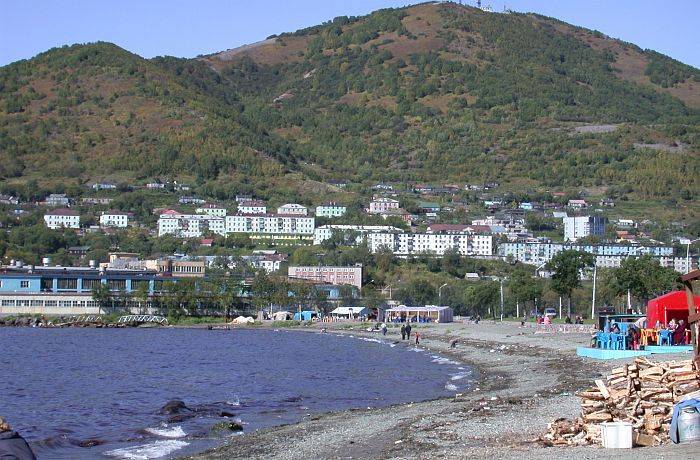 Scenic View of Buildings, a Gravel Beach, and Mountains in Vladivostok, Kamchatka Peninsula, Rossiyskaya Federatsiya - Russian Federation (Russia). Photo Credit: Dr. Igor Smolyar, NODC, NOAA; National Oceanic and Atmospheric Administration Photo Library (http://www.photolib.noaa.gov, mvey0727), Small World Collection, NOAA Central Library, National Oceanic and Atmospheric Administration (NOAA, http://www.noaa.gov), United States Department of Commerce (http://www.commerce.gov), Government of the United States of America (USA).