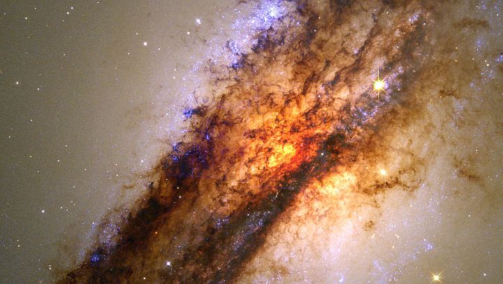 Very Active Galaxy Centaurus A -- NGC 5128. Photo Credit: Turbulent Cauldron of Starbirth in Nearby Active Galaxy, August 1, 1997 and January 10, 1998 (Release date: May 14, 1998), STScI-1998-14, NASA's Earth-orbiting Hubble Space Telescope (http://HubbleSite.org); E.J. Schreier (STScI), National Aeronautics and Space Administration (NASA, http://www.nasa.gov), Government of the United States of America (USA).
