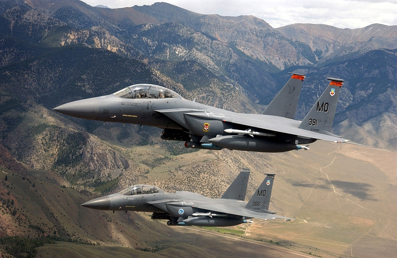 3. Two USAF F-15E Strike Eagle Fighter Jets Fly Low Over the Sawtooth Mountain Range  Photo Credit: Tech. Sgt. Debbie Hernandez, Air Force Link - Photos (http://www.af.mil/photos, 030624-F-8833H-050, 'Soaring Strike Eagles'), United States Air Force (USAF, http://www.af.mil), United States Department of Defense (DoD, http://www.DefenseLink.mil or http://www.dod.gov), Government of the United States of America (USA).