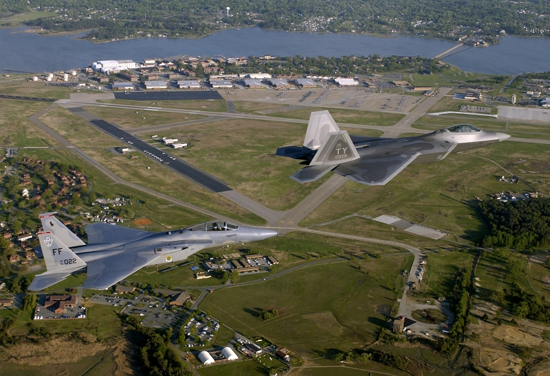 16. A USAF F-15 Eagle and A USAF F-22A Raptor Fly In Formation Over Langley Air Force Base, April 27, 2005, Commonwealth of Virginia, USA. Photo Credit: Tech. Sgt. Ben Bloker, United States Air Force; Defense Visual Information (DVI, http://www.DefenseImagery.mil, DF-SD-08-03269 and 050427-F-2295B-015) and United States Air Force (USAF, http://www.af.mil), United States Department of Defense (DoD, http://www.DefenseLink.mil or http://www.dod.gov), Government of the United States of America (USA).