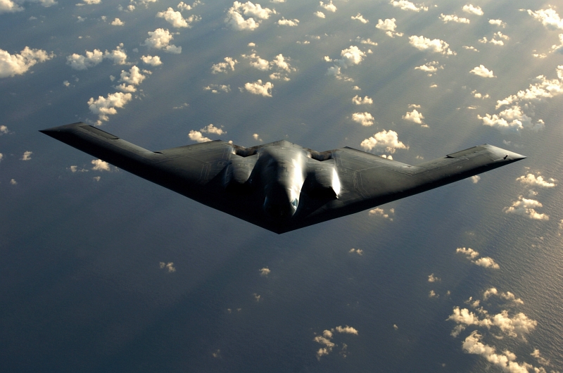 15. A U.S. Air Force B-2 Spirit Stealth Bomber Flying Over the Pacific Ocean, April 4, 2005. Photo Credit: Master Sgt. Val Gempis, United States Air Force; Defense Visual Information (DVI, http://www.DefenseImagery.mil, DF-SD-08-26862 and 050404-F-1740G-005) and United States Air Force (USAF, http://www.af.mil), United States Department of Defense (DoD, http://www.DefenseLink.mil or http://www.dod.gov), Government of the United States of America (USA).