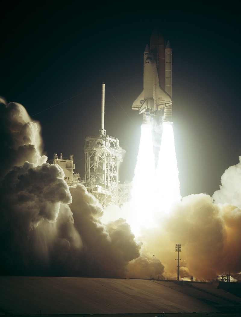 7. Huge Clouds of Steam and Smoke Roll Across Launch Pad 39A As Space Shuttle Endeavour (STS-123), Riding Atop Twin Pillars of Fire, Lifts Off Into Space on March 11, 2008 at 2:28 a.m. EDT - 06:28 GMT, NASA John F. Kennedy Space Center, State of Florida, USA. Photo Credit: NASA, Rick Wetherington, Tim Terry, and Tim Powers; Kennedy Media Gallery - STS-123 (http://mediaarchive.ksc.nasa.gov) Photo Number: KSC-08PP-0734, John F. Kennedy Space Center (KSC, http://www.nasa.gov/centers/kennedy), National Aeronautics and Space Administration (NASA, http://www.nasa.gov), Government of the United States of America.