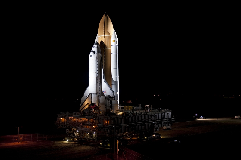 22. Space Shuttle Atlantis (STS-135) Rolls Out at Night to Launch Pad 39A, May 31, 2011, NASA Kennedy Space Center, State of Florida, USA. Photo Credit: Kim Shiflett, Kennedy Media Gallery (http://mediaarchive.ksc.nasa.gov) Photo Number: KSC-2011-4113, John F. Kennedy Space Center (KSC, http://www.nasa.gov/centers/kennedy), National Aeronautics and Space Administration (NASA, http://www.nasa.gov), Government of the United States of America.