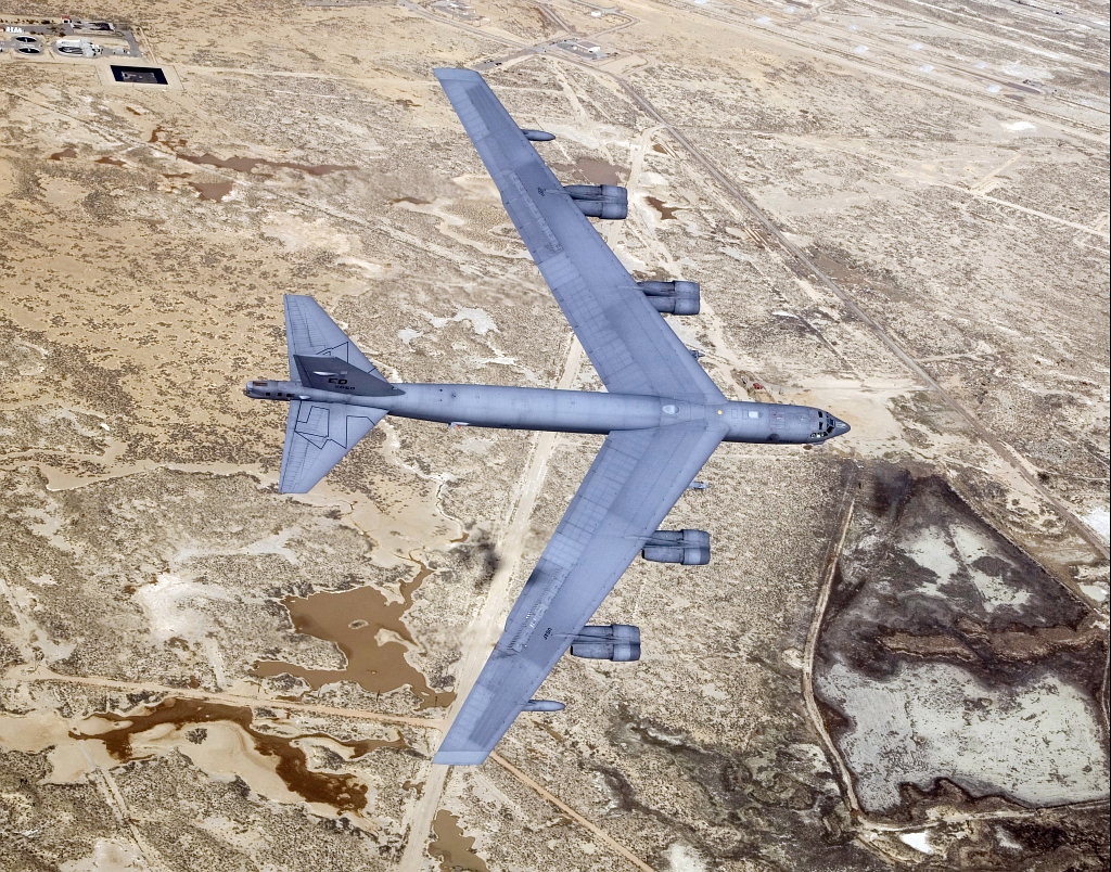 6. U.S. Air Force B-52 Stratofortress Bomber Flies Over Edwards Air Force Base, December 2, 2004, State of California, USA. Photo Credit: Bobbi C. Garcia, Civ, United States Air Force (USAF, http://www.af.mil); Defense Visual Information Center (DVIC, http://www.DoDMedia.osd.mil, DF-SD-07-40888 and 041202-F-9126G-039) and United States Air Force (USAF, http://www.af.mil), United States Department of Defense (DoD, http://www.DefenseLink.mil or http://www.dod.gov), Government of the United States of America (USA).