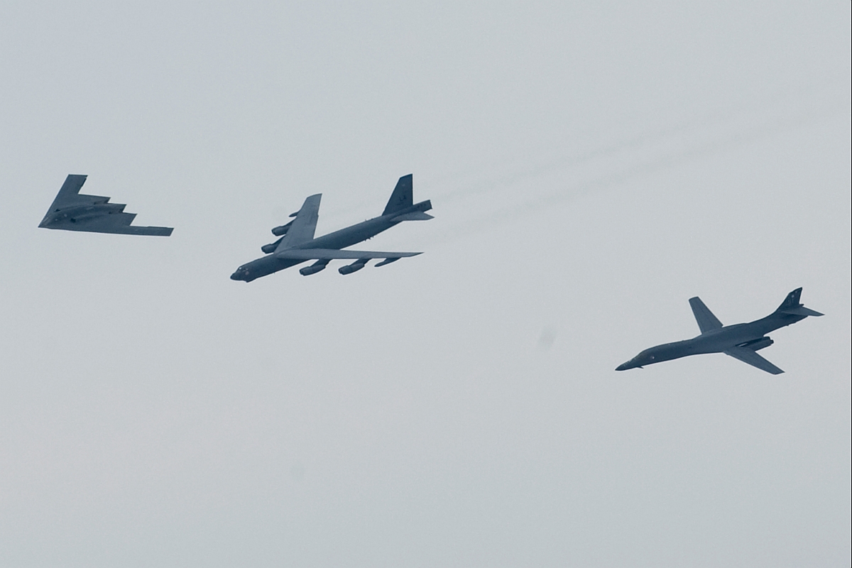 1. B-2 Spirit stealth heavy bomber (left), B-52 Stratofortress heavy bomber (center), B-1B Lancer supersonic heavy bomber (right) fly in formation over Shreveport, Louisiana, USA, on 10 May 2008 for the 75th Anniversary of Barksdale Air Force Base (AFB) celebration. Image ID: 080510-F-0986R-002