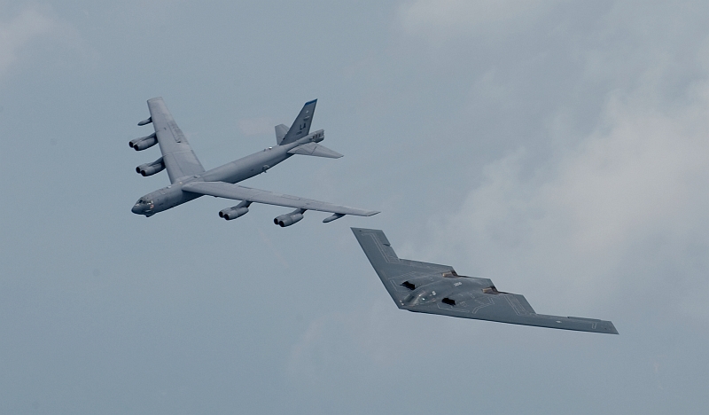 11. A United States Air Force B-52 Stratofortress Bomber and a United States Air Force B-2 Spirit Stealth Bomber Fly In Formation Over Shreveport During the 2008 Defenders of Liberty Airshow and Open House at Barksdale Air Force Base, May 10, 2008, Shreveport, State of Louisiana, USA. Photo Credit: SSgt. Samuel E. Rogers, 1st Fighter Wing Public Affairs, Air Force Link - Photos (http://www.af.mil/photos, 080510-F-0986R-005, '75th Anniversary of Barksdale AFB'), United States Air Force (USAF, http://www.af.mil), United States Department of Defense (DoD, http://www.DefenseLink.mil or http://www.dod.gov), Government of the United States of America (USA).