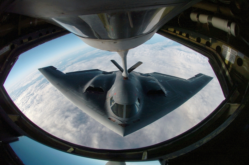 18. A U.S. Air Force B-2 Spirit Stealth Bomber Refuels From an Illinois Air National Guard KC-135 Stratotanker Over the Pacific Ocean, April 4, 2005. Photo Credit: Master Sgt. Val Gempis, United States Air Force; Defense Visual Information (DVI, http://www.DefenseImagery.mil, DF-SD-07-04347 and 050404-F-1740G-001) and United States Air Force (USAF, http://www.af.mil), United States Department of Defense (DoD, http://www.DefenseLink.mil or http://www.dod.gov), Government of the United States of America (USA).