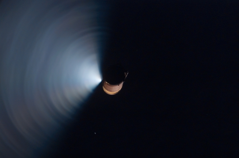 41. Backdropped By the Blackness of Space, the External Tank (ET) Vents Residual Cryogenics -- Liquid Oxygen (LOX) and Liquid Hydrogen (LH2) -- After Separating From Space Shuttle Atlantis, February 7, 2008, As Seen From Space Shuttle Atlantis (STS-122). Photo Credit: STS-122 Shuttle Mission Imagery (http://spaceflight.nasa.gov/gallery/images/shuttle/sts-122/ndxpage1.html), S122-E-005032 (http://spaceflight.nasa.gov/gallery/images/shuttle/sts-122/html/s122e005032.html), NASA Human Space Flight (http://spaceflight.nasa.gov), National Aeronautics and Space Administration (NASA, http://www.nasa.gov), Government of the United States of America. Explanation from NASA: "An STS-122 crewmember recorded the scene with a digital still camera. The fan-shaped bright area is the result of ET venting after orbiter separation. What happens in this nominal occurence is that the residual cryogenics in the tank heat up to some extent and the pressure increases, popping the relief valve. The residual LOX and LH2 spray out of the tank and are quite noticeable with the light reflection."