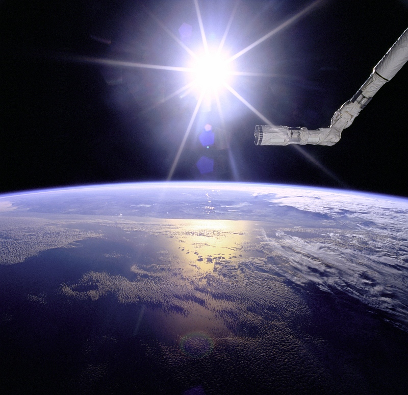 23. Brilliant Sunburst Over Earth, May 1996, As Seen From Space Shuttle Endeavour (STS-77). Photo Credit: NASA; Earth's atmospheric limb, Space Shuttle Endeavour (STS-66) Remote Manipulator System (RMS) Canada Arm (Robot Arm), Sunburst over Earth, GRIN (http://grin.hq.nasa.gov) Database Number: GPN-2000-001097, National Aeronautics and Space Administration (NASA, http://www.nasa.gov), Government of the United States of America.
