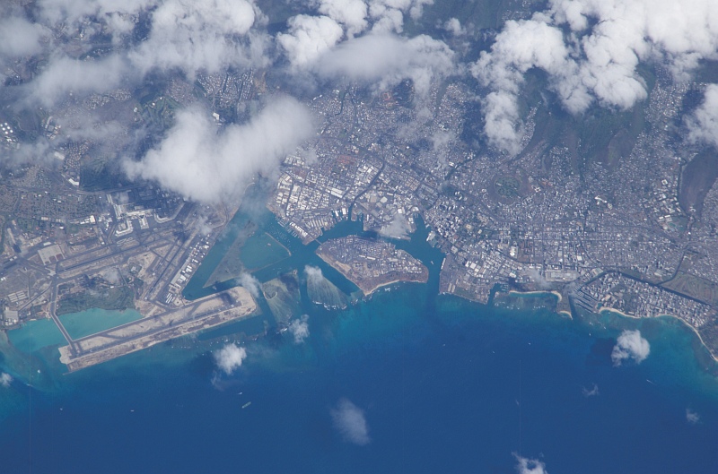 24. Clouds Over Oaho, State of Hawaii, USA, October 8, 2003, As Seen From the International Space Station (Expedition 7). Photo Credit: NASA; ISS007-E-16807, Oahu, Hawaii, Honolulu International Airport, Keehi Lagoon, Sand Island, Pacific Ocean, International Space Station (Expedition Seven); Image Science and Analysis Laboratory, NASA-Johnson Space Center. 'Astronaut Photography of Earth - Display Record.' <http://eol.jsc.nasa.gov/scripts/sseop/photo.pl?mission=ISS007&roll=E&frame=16807>; National Aeronautics and Space Administration (NASA, http://www.nasa.gov), Government of the United States of America (USA).