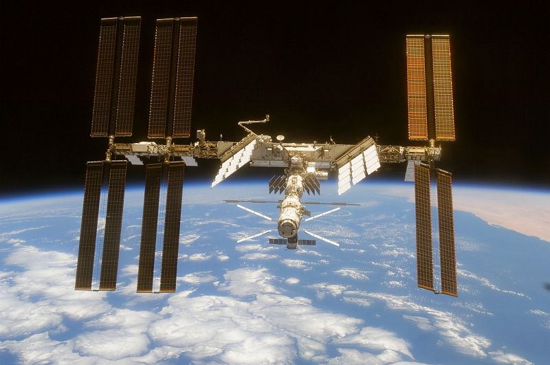 33. Another Spectacular View of the Blackness of Space, Earth's Horizon, White Cloud Formations, Blue Water, and the International Space Station Orbiting Over Planet Earth, June 11, 2008, As Seen From Space Shuttle Discovery (STS-124). Photo Credit: STS-124 Shuttle Mission Imagery (http://spaceflight.nasa.gov/gallery/images/shuttle/sts-124/ndxpage1.html), S124-E-010013 (http://spaceflight.nasa.gov/gallery/images/shuttle/sts-124/html/s124e010013.html), NASA Human Space Flight (http://spaceflight.nasa.gov), National Aeronautics and Space Administration (NASA, http://www.nasa.gov), Government of the United States of America.