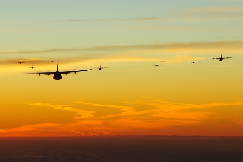 47. Exercise Bayonet Resolve: Early In the Morning, U.S. Air Force C-130J Super Hercules Aircraft From the 37th Airlift Squadron at Ramstein Air Base, Germany, Fly In A 10-Ship Formation Over Southern Germany, October 5, 2011, Bundesrepublik Deutschland - Federal Republic of Germany. Photo Credit: Senior Airman Stephen J. Otero, United States Air Force; Ramstein Air Base - Photos (http://www.ramstein.af.mil/photos, 111005-F-QF220-016, 'Dawn'), United States Air Force (USAF, http://www.af.mil), United States Department of Defense (DoD, http://www.DefenseLink.mil or http://www.dod.gov), Government of the United States of America (USA).