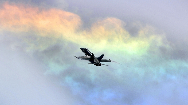4. An F/A-18C Hornet Fighter Jet Attached to the 'Raging Bulls' of Strike Fighter Squadron Thirty-Seven (VFA-37) climbs through Rainbow-Colored Cloud(s), Norfolk, Commonwealth of Virginia, USA. Photo Credit: Mass Communication Specialist 2nd Class Kristopher Wilson, Navy NewsStand - Eye on the Fleet Photo Gallery (http://www.news.navy.mil/view_photos.asp, 070602-N-5345W-358), United States Navy (USN, http://www.navy.mil), United States Department of Defense (DoD, http://www.DefenseLink.mil or http://www.dod.gov), Government of the United States of America (USA).